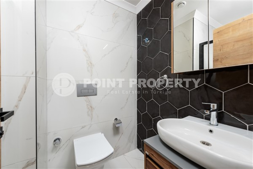 Двухкомнатная квартира, 50м², с чистовой отделкой в новом комплексе в районе Авсаллар, Алания-id-2738-фото-5