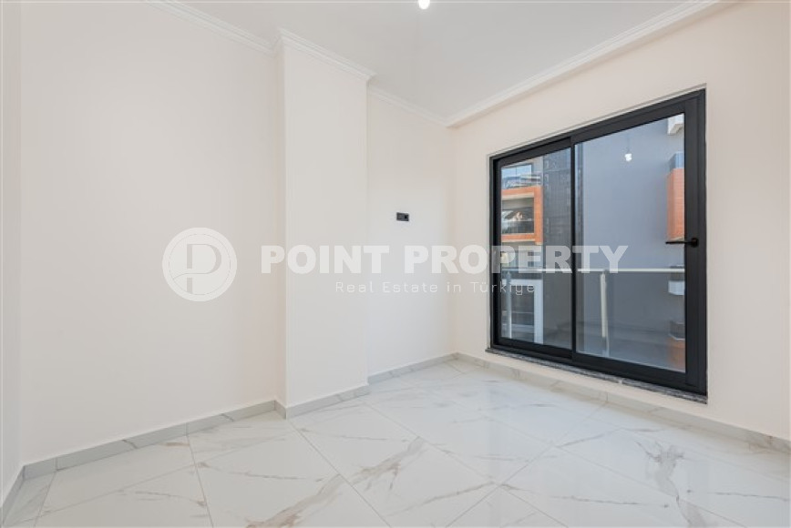 Двухкомнатная квартира, 50м², с чистовой отделкой в новом комплексе в районе Авсаллар, Алания-id-2738-фото-6