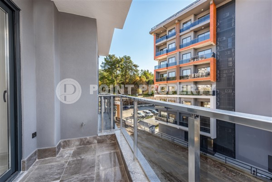 Двухкомнатная квартира, 50м², с чистовой отделкой в новом комплексе в районе Авсаллар, Алания-id-2738-фото-7