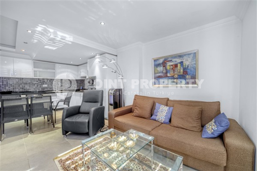 Элегантная двухкомнатная квартира, 80м², в комфортабельном комплексе в районе Алании – Джикджилли-id-2739-фото-2