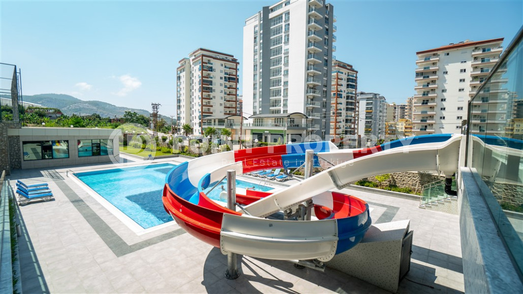 New furnished 1+1 apartment with an area of 50 m² in a complex with hotel infrastructure in Mahmutlar-id-1241-photo-8