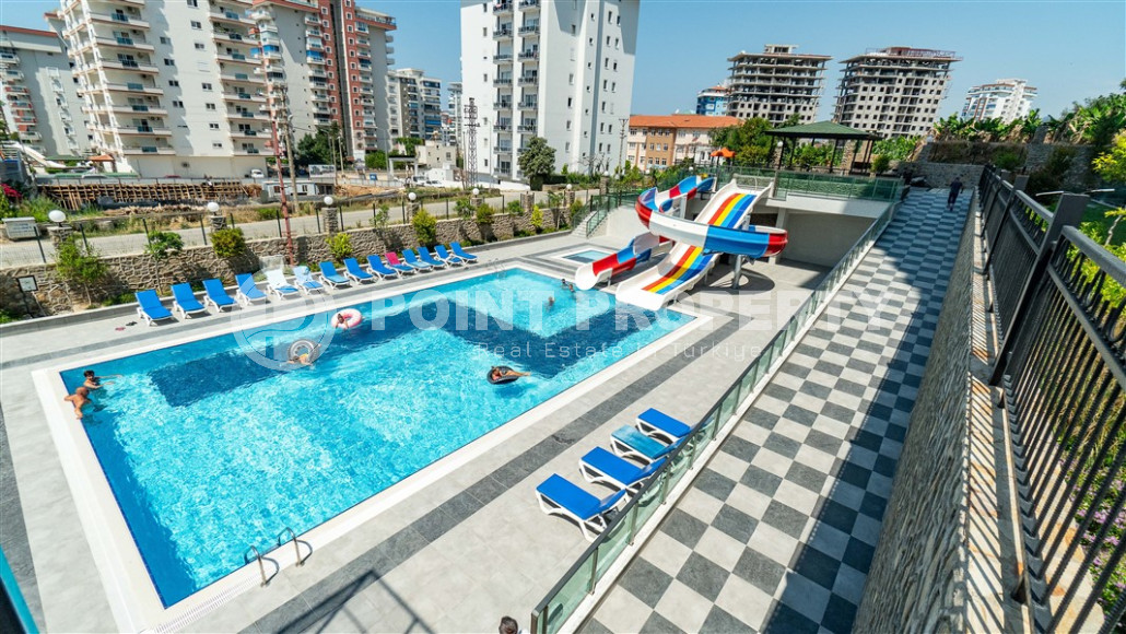 New furnished 1+1 apartment with an area of 50 m² in a complex with hotel infrastructure in Mahmutlar-id-1241-photo-10