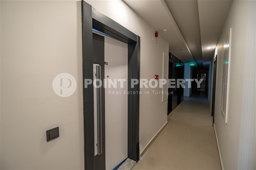 New furnished 1+1 apartment with an area of 50 m² in a complex with hotel infrastructure in Mahmutlar-id-1241-photo-11