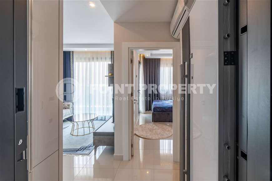 New furnished 1+1 apartment with an area of 50 m² in a complex with hotel infrastructure in Mahmutlar-id-1241-photo-12