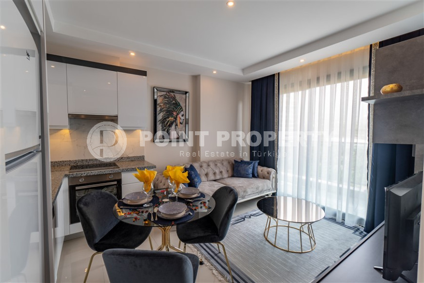 New furnished 1+1 apartment with an area of 50 m² in a complex with hotel infrastructure in Mahmutlar-id-1241-photo-13