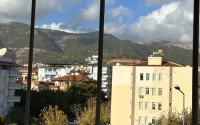 Modern two-room apartment with mountain views, 70 m2, Alanya center, 150 meters from the sea-id-2743-photo-1