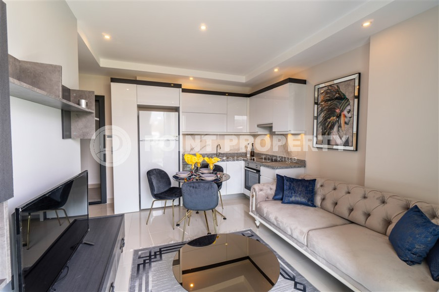 New furnished 1+1 apartment with an area of 50 m² in a complex with hotel infrastructure in Mahmutlar-id-1241-photo-14