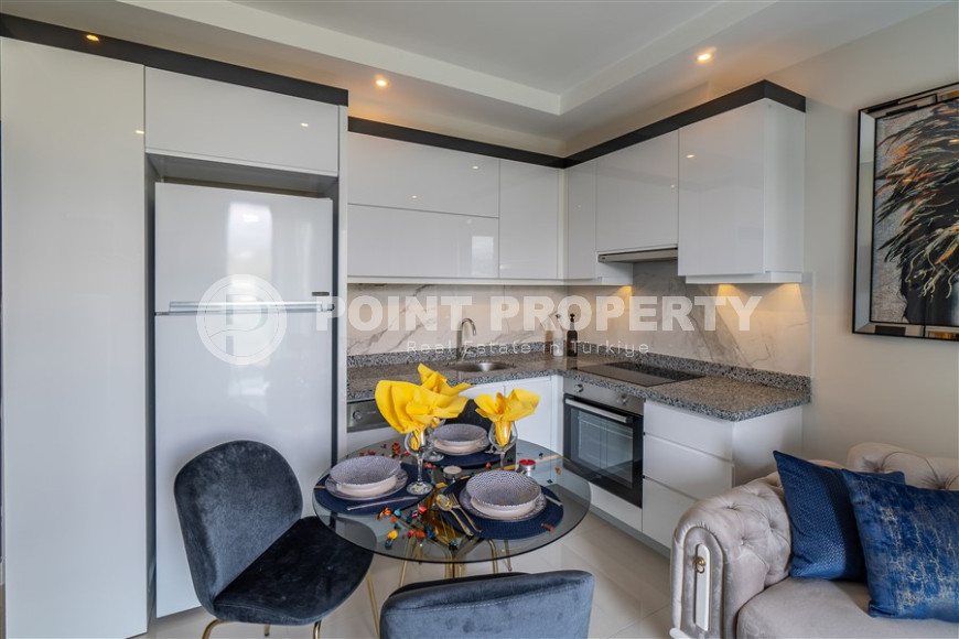 New furnished 1+1 apartment with an area of 50 m² in a complex with hotel infrastructure in Mahmutlar-id-1241-photo-16