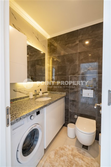 New furnished 1+1 apartment with an area of 50 m² in a complex with hotel infrastructure in Mahmutlar-id-1241-photo-20