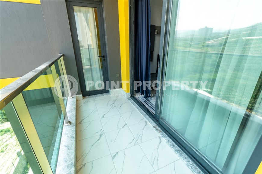 New furnished 1+1 apartment with an area of 50 m² in a complex with hotel infrastructure in Mahmutlar-id-1241-photo-22