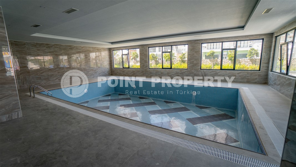 New furnished 1+1 apartment with an area of 50 m² in a complex with hotel infrastructure in Mahmutlar-id-1241-photo-24