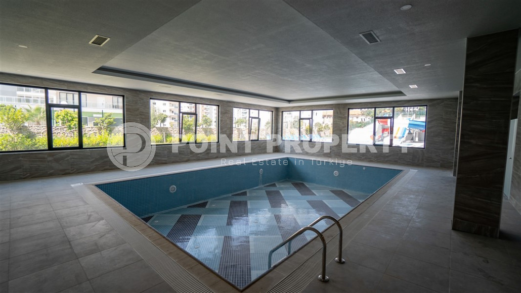 New furnished 1+1 apartment with an area of 50 m² in a complex with hotel infrastructure in Mahmutlar-id-1241-photo-25