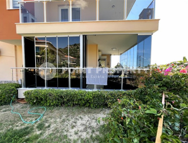 Квартира с выходом в сад, площадью 120 м2, планировкой 2+1 в районе Каргыджак, Аланья-id-2752-фото-2