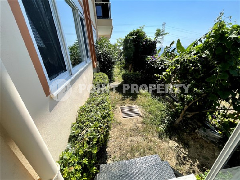 Квартира с выходом в сад, площадью 120 м2, планировкой 2+1 в районе Каргыджак, Аланья-id-2752-фото-15