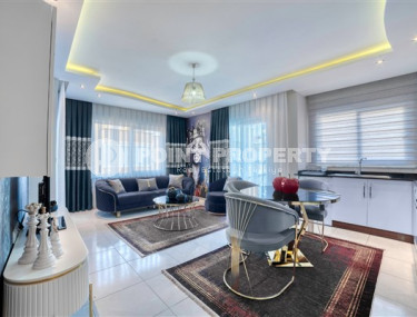 Luxury apartment with exquisite interior, 150 m from the sea, with a total area of 70 m2, in Mahmutlar area, Alanya-id-2753-photo-1