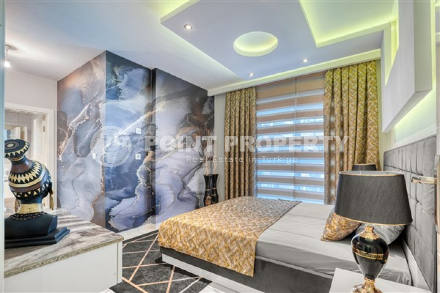 Luxury apartment with exquisite interior, 150 m from the sea, with a total area of 70 m2, in Mahmutlar area, Alanya-id-2753-photo-5