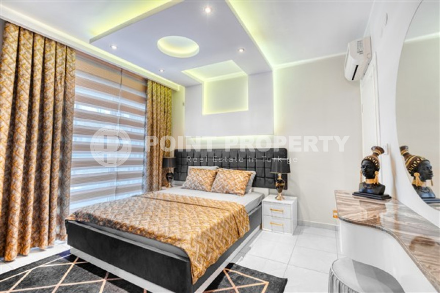Luxury apartment with exquisite interior, 150 m from the sea, with a total area of 70 m2, in Mahmutlar area, Alanya-id-2753-photo-6