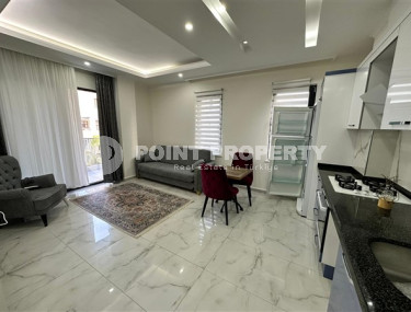 Новая меблированная квартира с одной спальней, 65м². в комплексе с инфраструктурой в районе Махмутлар, Алания-id-2754-фото-2