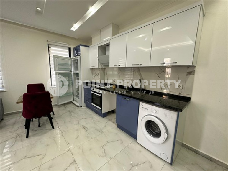 Новая меблированная квартира с одной спальней, 65м². в комплексе с инфраструктурой в районе Махмутлар, Алания-id-2754-фото-3