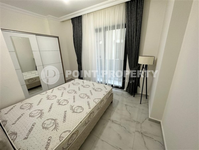 Новая меблированная квартира с одной спальней, 65м². в комплексе с инфраструктурой в районе Махмутлар, Алания-id-2754-фото-7