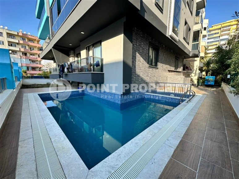 Новая меблированная квартира с одной спальней, 65м². в комплексе с инфраструктурой в районе Махмутлар, Алания-id-2754-фото-11