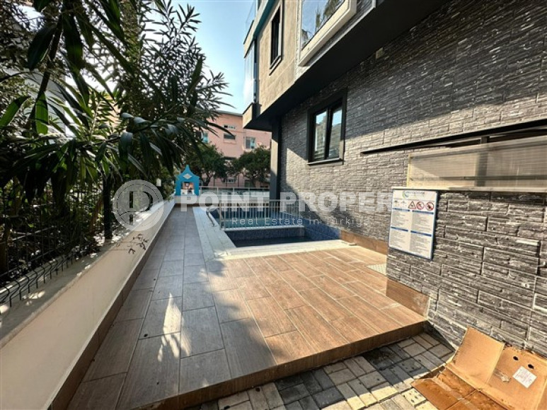 Новая меблированная квартира с одной спальней, 65м². в комплексе с инфраструктурой в районе Махмутлар, Алания-id-2754-фото-12