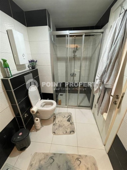 Красивая и небольшая квартира 1+1, 65 м2, с нестандартным дизайном в районе Джикджилли, Аланья-id-2768-фото-11