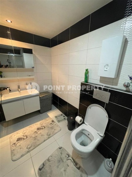 Красивая и небольшая квартира 1+1, 65 м2, с нестандартным дизайном в районе Джикджилли, Аланья-id-2768-фото-12