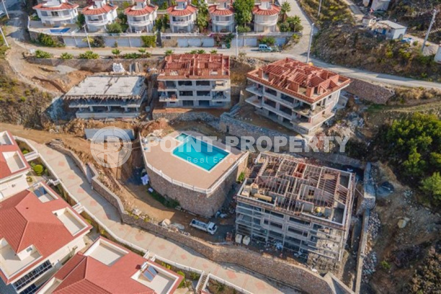 Новый 135 м2 дуплекс 3+2, в строящемся трехэтажном комплексе, Каргыджак, Аланья-id-2771-фото-13