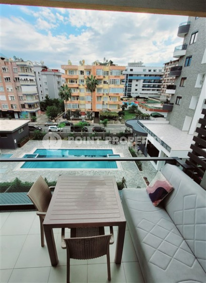 Elegant and small two-room apartment in the lower Oba area, Alanya, 150 meters from the sea, in a five-story complex with 24-hour security-id-2784-photo-2