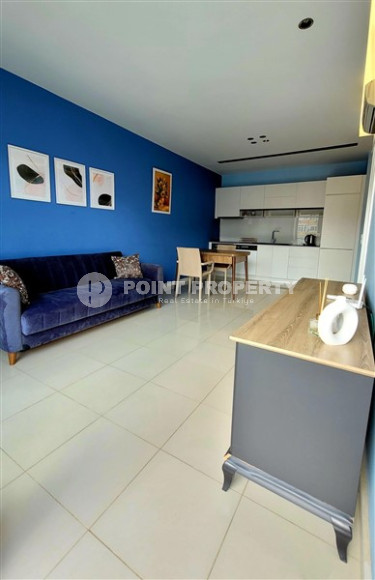 Elegant and small two-room apartment in the lower Oba area, Alanya, 150 meters from the sea, in a five-story complex with 24-hour security-id-2784-photo-3
