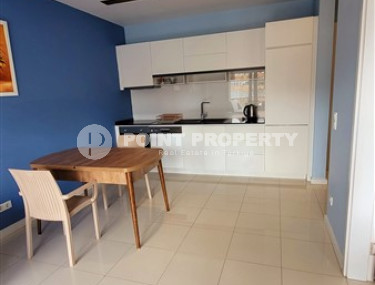 Elegant and small two-room apartment in the lower Oba area, Alanya, 150 meters from the sea, in a five-story complex with 24-hour security-id-2784-photo-5