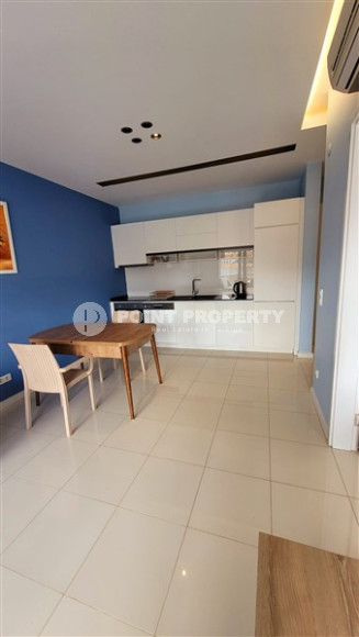 Elegant and small two-room apartment in the lower Oba area, Alanya, 150 meters from the sea, in a five-story complex with 24-hour security-id-2784-photo-5