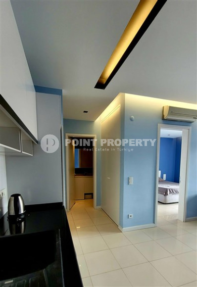 Elegant and small two-room apartment in the lower Oba area, Alanya, 150 meters from the sea, in a five-story complex with 24-hour security-id-2784-photo-12