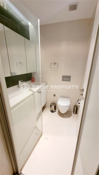 Elegant and small two-room apartment in the lower Oba area, Alanya, 150 meters from the sea, in a five-story complex with 24-hour security-id-2784-photo-15