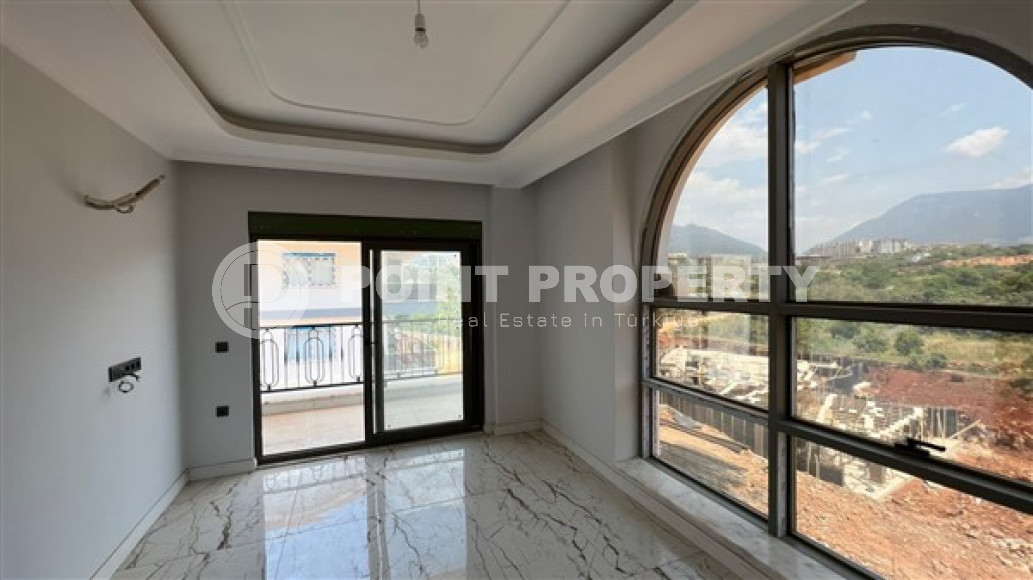 Двухкомнатная квартира, 50м², с видом на горы в резиденции с обширной инфраструктурой в Оба, Алания-id-2785-фото-3