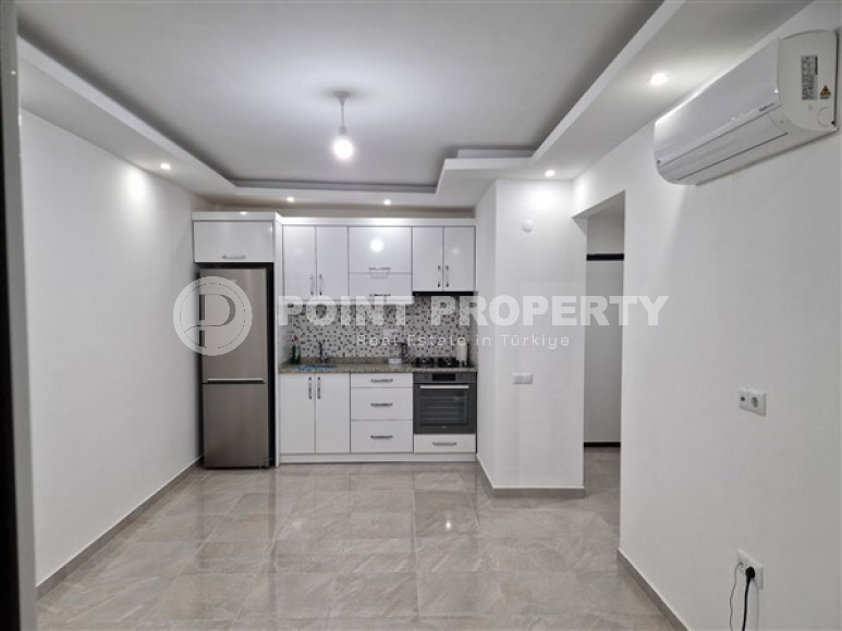 Небольшая двухкомнатная квартира в районе Конаклы, 60 м2, в 450 метрах от Средиземного моря-id-2797-фото-11