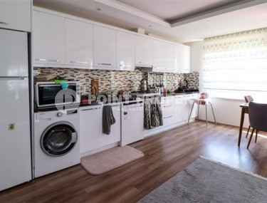 Classic three-room apartment, Mahmutlar, Alanya, with mountain views and 100 meters from the center of the area-id-2807-photo-2