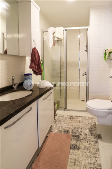 Classic three-room apartment, Mahmutlar, Alanya, with mountain views and 100 meters from the center of the area-id-2807-photo-3