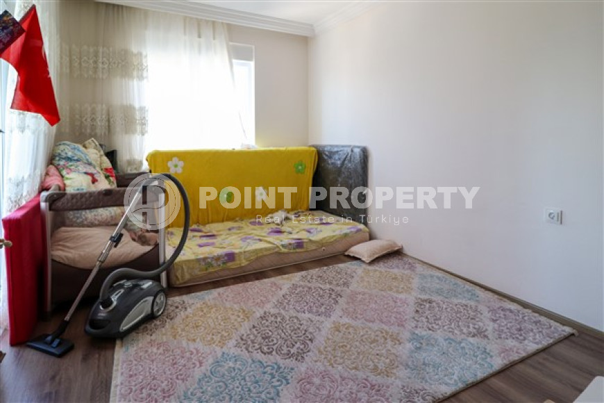 Classic three-room apartment, Mahmutlar, Alanya, with mountain views and 100 meters from the center of the area-id-2807-photo-4