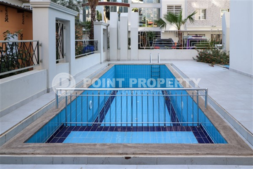 Classic three-room apartment, Mahmutlar, Alanya, with mountain views and 100 meters from the center of the area-id-2807-photo-10