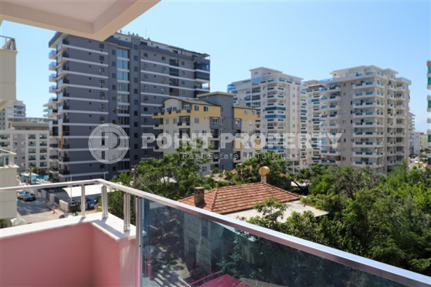 Classic three-room apartment, Mahmutlar, Alanya, with mountain views and 100 meters from the center of the area-id-2807-photo-14