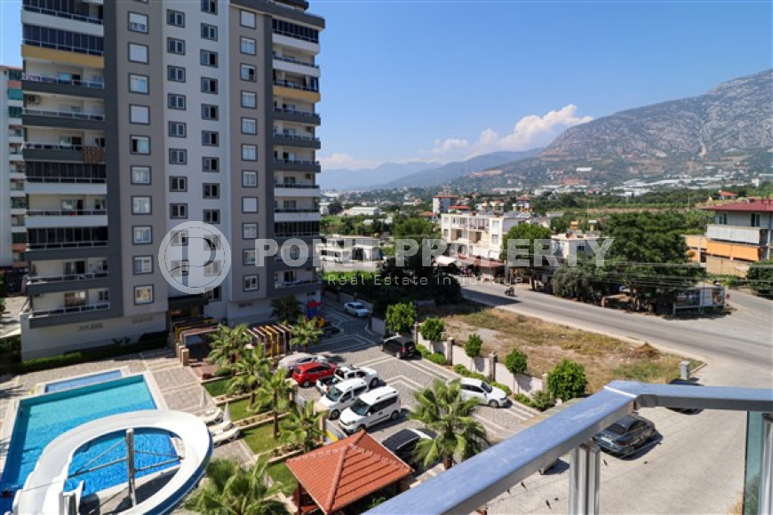 Classic three-room apartment, Mahmutlar, Alanya, with mountain views and 100 meters from the center of the area-id-2807-photo-15