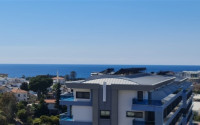 One-bedroom apartment under construction 550 m from the sea, 61 m², in Kargicak area, Alanya-id-2811-photo-1