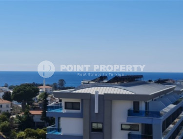 One-bedroom apartment under construction 550 m from the sea, 61 m², in Kargicak area, Alanya-id-2811-photo-1