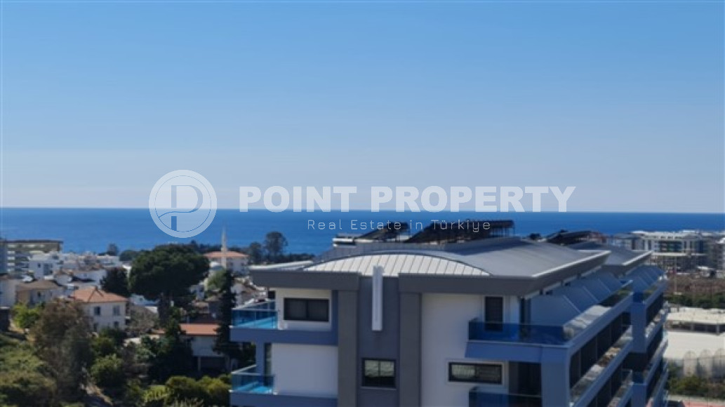 One-bedroom apartment under construction 550 m from the sea, 61 m², in Kargicak area, Alanya-id-2811-photo-1