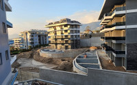 One-bedroom apartment under construction 550 m from the sea, 61 m², in Kargicak area, Alanya-id-2811-photo-2