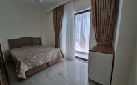 Stylish, two-room apartment with 1+1 layout, 75m2 in Alanya, in the popular Mahmutlar area.-id-1250-photo-1