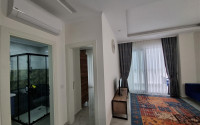 Stylish, two-room apartment with 1+1 layout, 75m2 in Alanya, in the popular Mahmutlar area.-id-1250-photo-2
