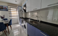 Stylish, two-room apartment with 1+1 layout, 75m2 in Alanya, in the popular Mahmutlar area.-id-1250-photo-3